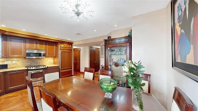 2421 Ocean Ave Unit 7A, Brooklyn, NY 11229 - dining area with a chandelier and recessed lighting