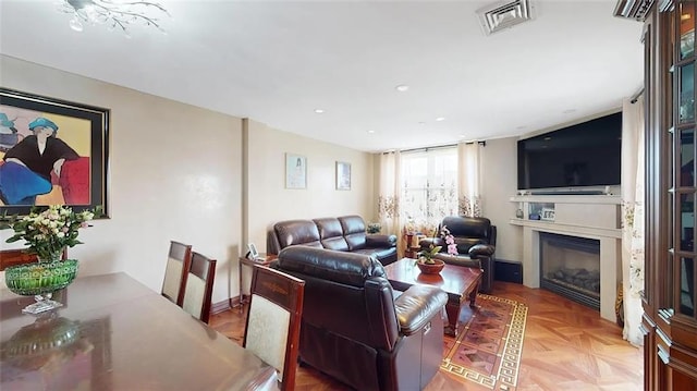 2421 Ocean Ave Unit 7A, Brooklyn, NY 11229 - living area featuring a glass covered fireplace and recessed lighting