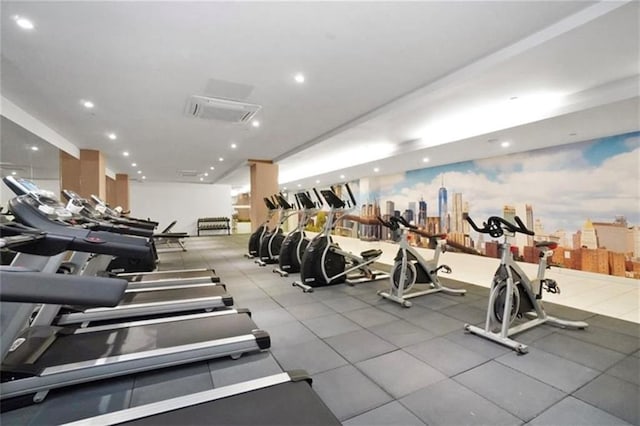 exercise room featuring recessed lighting