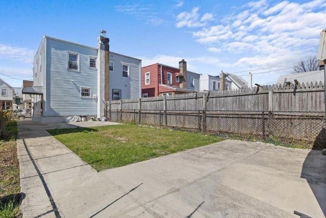 1505 E 54th St, Brooklyn, NY 11234 - rear view of house featuring a patio area and a residential view