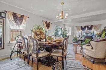 1505 E 54th St, Brooklyn, NY 11234 - dining room with a chandelier and wood finished floors