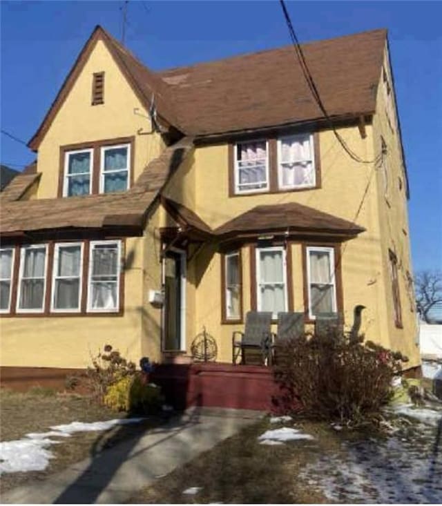 19907 100th Ave, Hollis, NY 11423 - view of front of property with stucco siding