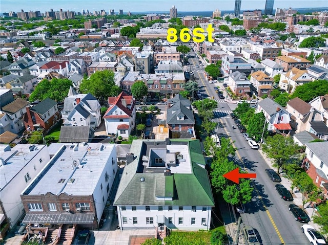 aerial view of property and surrounding area with nearby urban area and nearby suburban area