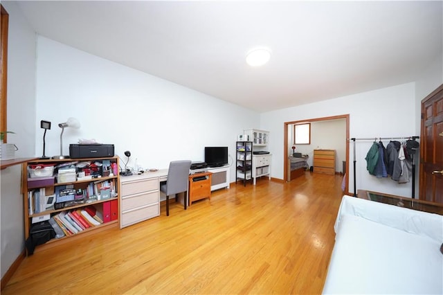 office space featuring light wood-style flooring