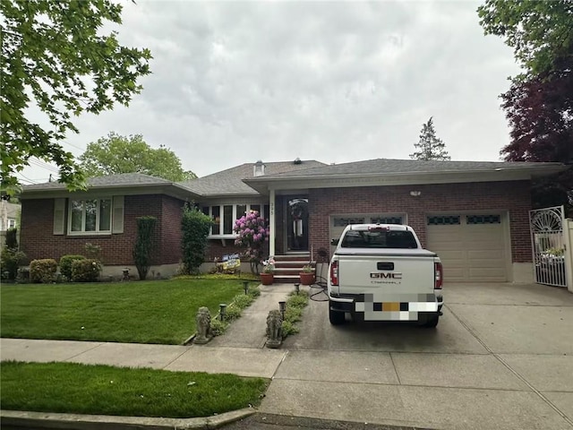 single story home with driveway, brick siding, an attached garage, and a front yard