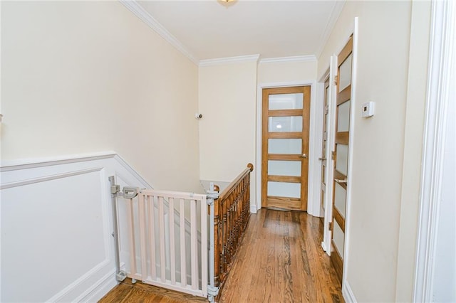 30-30 78th St, Queens, NY 11370 - hallway with an upstairs landing, wood finished floors, and crown molding