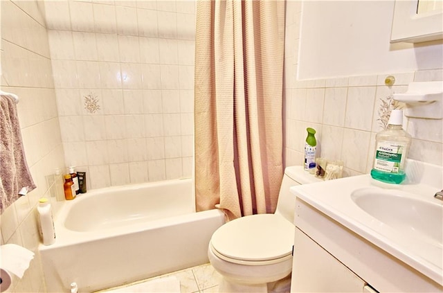 651 E 21st St, Brooklyn, NY 11226 - full bathroom featuring tile walls, toilet, shower / tub combo, and vanity