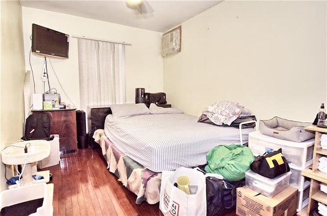 bedroom featuring hardwood / wood-style floors