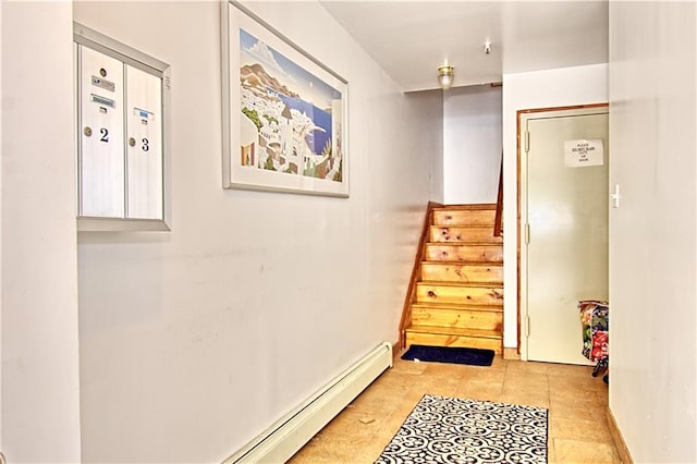 hall with stairs and baseboards