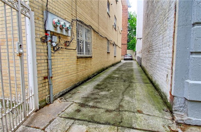 view of side of property with brick siding