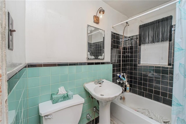 1333 Shore Pkwy Unit A, Brooklyn, NY 11214 - full bathroom with toilet, shower / bath combo, tile walls, and a wainscoted wall