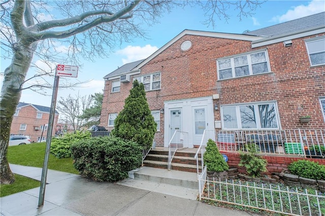 1333 Shore Pkwy Unit A, Brooklyn, NY 11214 - view of front of house featuring brick siding