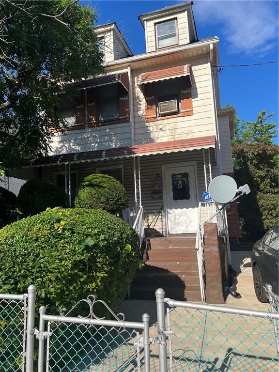 2233 E 16th St, Brooklyn, NY 11229 - view of front of home featuring a gate and a porch