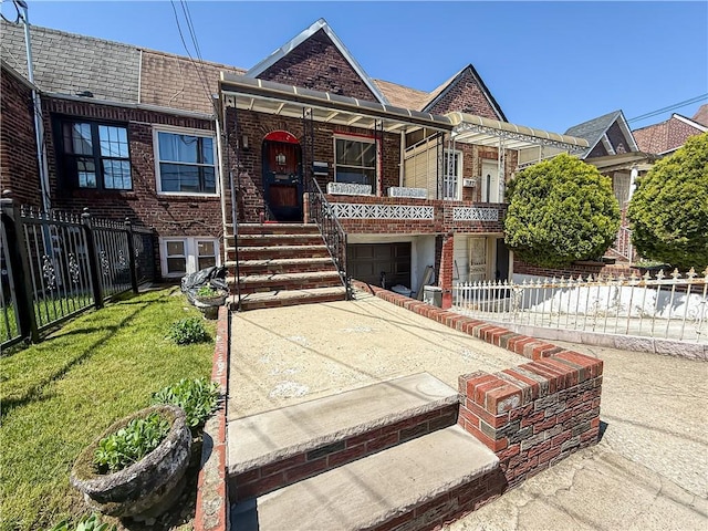 156 E 88th St, Brooklyn, NY 11236 - view of front of house featuring brick siding, covered porch, an attached garage, and concrete driveway