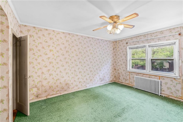 1484 E 16th St, Brooklyn, NY 11230 - carpeted empty room with radiator heating unit, crown molding, a ceiling fan, and wallpapered walls