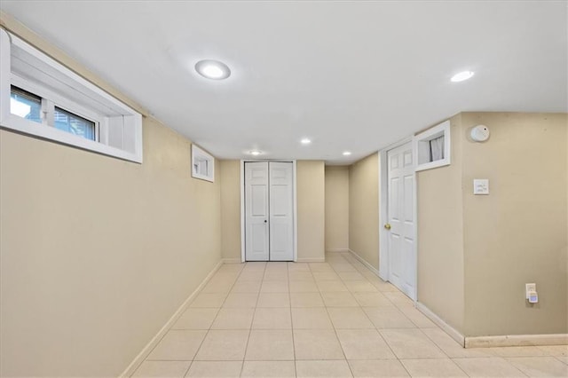 628 Thomas S Boyland St, Brooklyn, NY 11212 - finished basement featuring recessed lighting, baseboards, and light tile patterned flooring