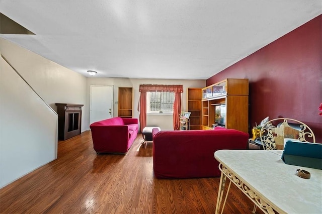 628 Thomas S Boyland St, Brooklyn, NY 11212 - living room featuring wood finished floors and a fireplace