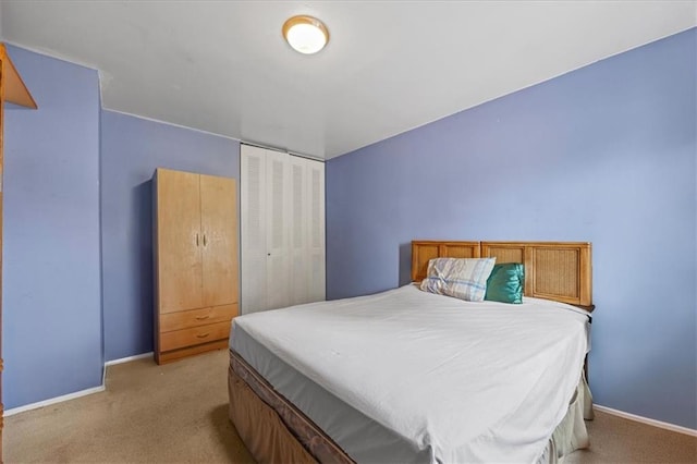 628 Thomas S Boyland St, Brooklyn, NY 11212 - bedroom featuring light carpet, baseboards, and a closet