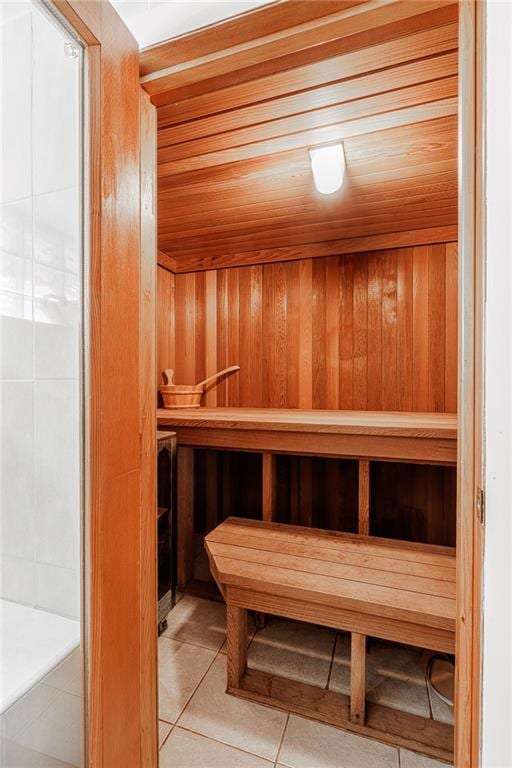 2077 E 22nd St, Brooklyn, NY 11229 - sauna featuring tile patterned flooring, wood ceiling, and wooden walls