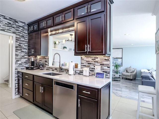 139 Tennyson Dr, Staten Island, NY 10308 - kitchen with stainless steel dishwasher, a sink, light tile patterned floors, decorative backsplash, and crown molding