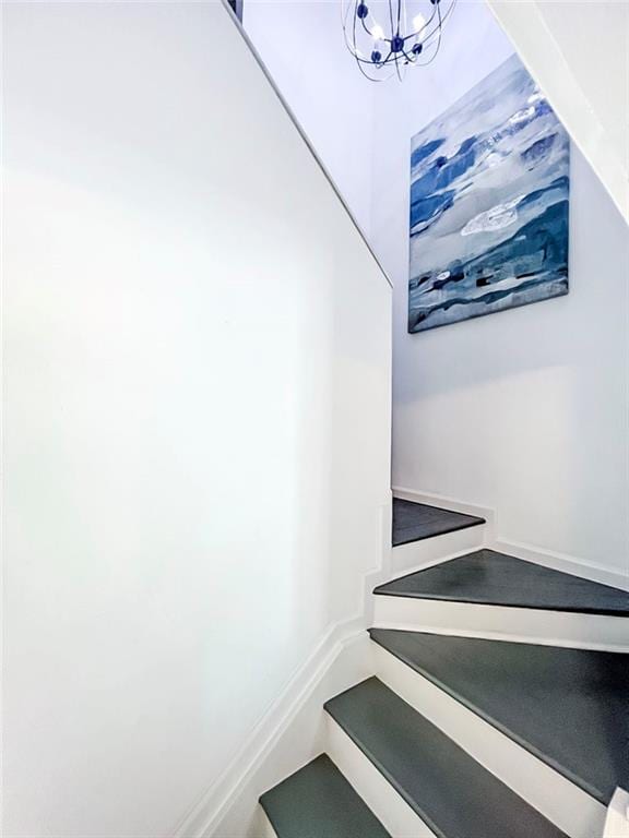 139 Tennyson Dr, Staten Island, NY 10308 - staircase with a chandelier