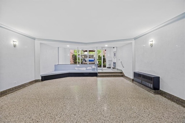 9040 Fort Hamilton Pkwy Unit 2I, Brooklyn, NY 11209 - unfurnished living room with speckle patterned floor and baseboards
