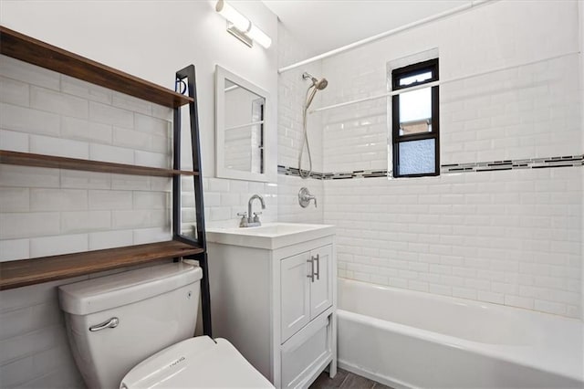 9040 Fort Hamilton Pkwy Unit 2I, Brooklyn, NY 11209 - full bath with toilet, shower / bathtub combination, tile walls, vanity, and backsplash