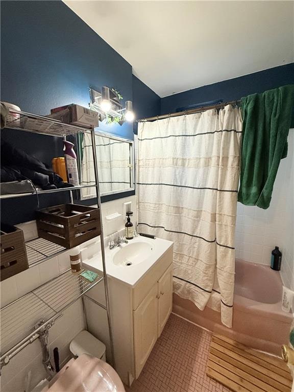 9511 Shore Rd Unit 617, Brooklyn, NY 11209 - full bathroom featuring vanity, shower / tub combo with curtain, and toilet