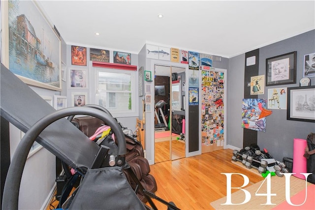 2544 E 64th St, Brooklyn, NY 11234 - workout area with wood finished floors, crown molding, baseboards, and recessed lighting