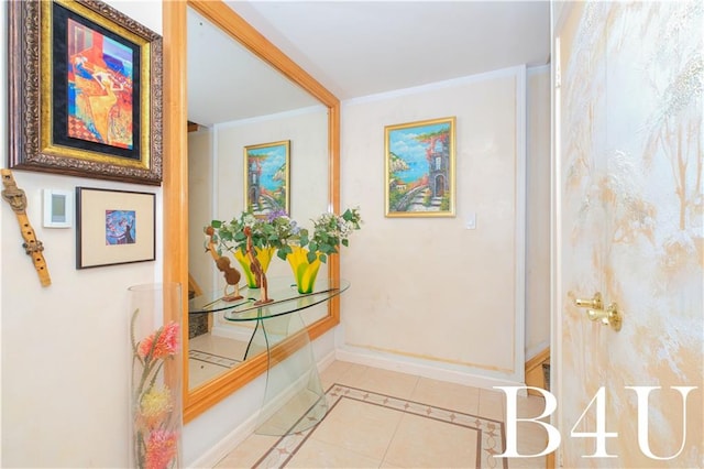 2544 E 64th St, Brooklyn, NY 11234 - hallway with light tile patterned floors, baseboards, and ornamental molding