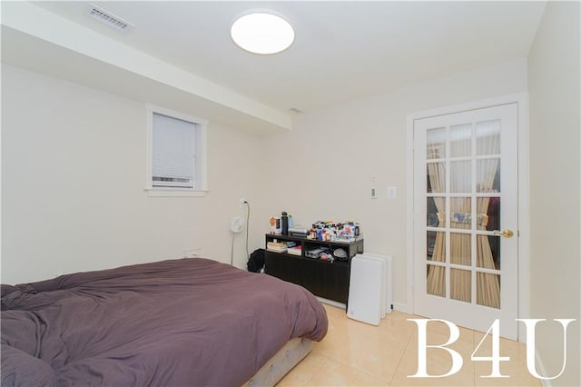 2544 E 64th St, Brooklyn, NY 11234 - bedroom with light tile patterned floors