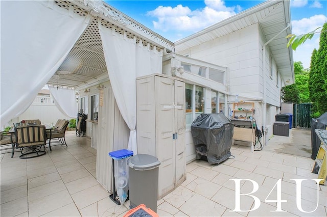 2544 E 64th St, Brooklyn, NY 11234 - view of patio with outdoor dining space and a grill