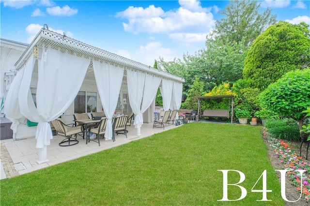 2544 E 64th St, Brooklyn, NY 11234 - view of grassy yard featuring a patio