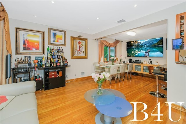 2544 E 64th St, Brooklyn, NY 11234 - living area featuring wood finished floors, baseboards, and recessed lighting