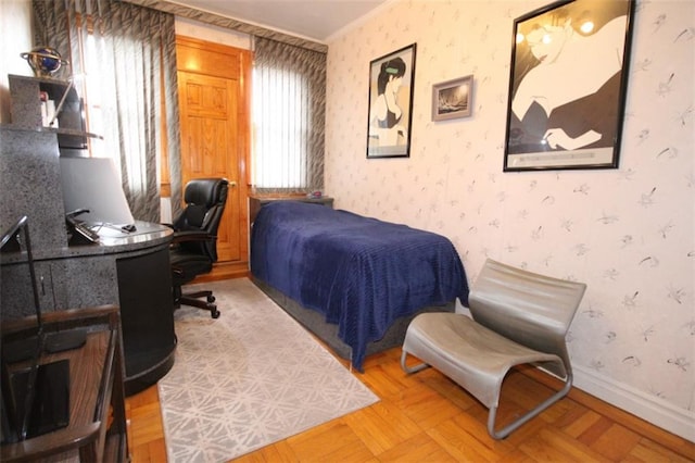 119 Langham St, Brooklyn, NY 11235 - bedroom featuring wallpapered walls, crown molding, and an office area