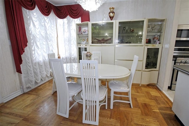 119 Langham St, Brooklyn, NY 11235 - dining space featuring a chandelier