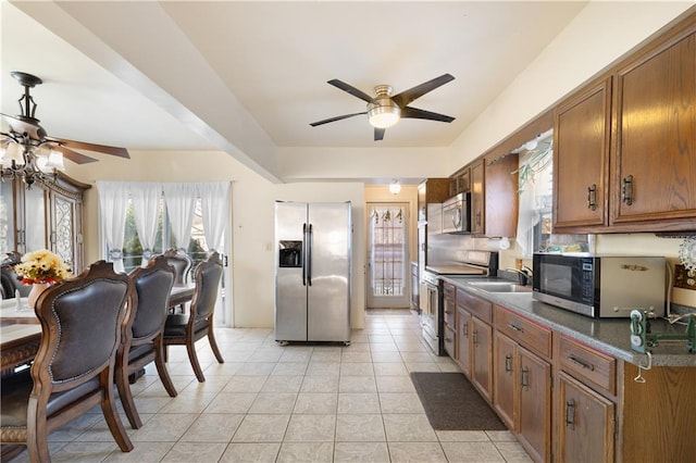 432 Neckar Ave, Staten Island, NY 10304 - kitchen featuring stainless steel appliances, a ceiling fan, and brown cabinetry