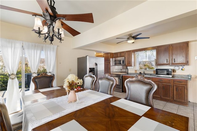 432 Neckar Ave, Staten Island, NY 10304 - dining area featuring a ceiling fan and light tile patterned floors