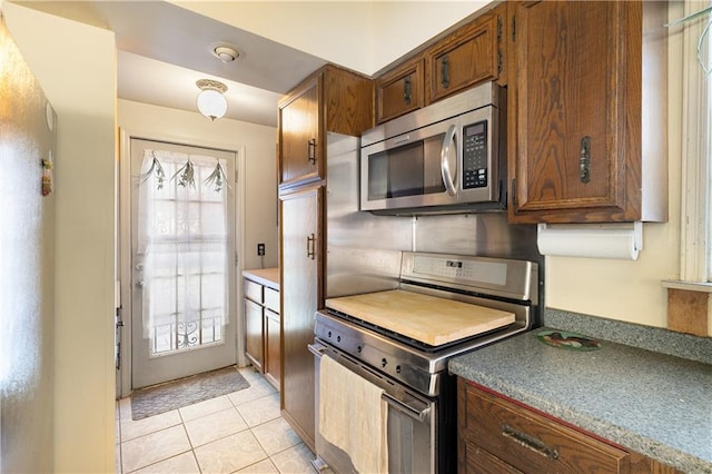 432 Neckar Ave, Staten Island, NY 10304 - kitchen featuring appliances with stainless steel finishes and light tile patterned flooring