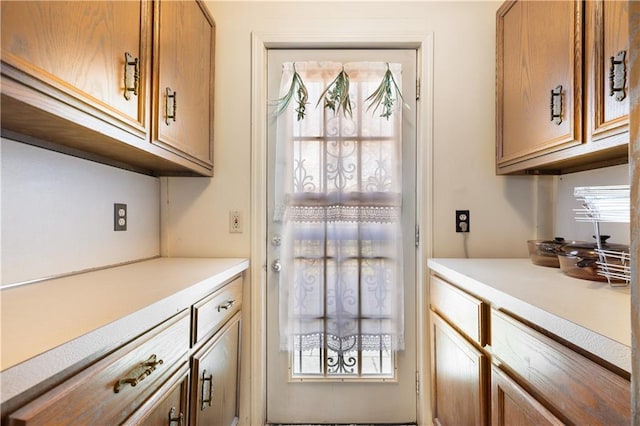 432 Neckar Ave, Staten Island, NY 10304 - kitchen featuring light countertops and brown cabinetry