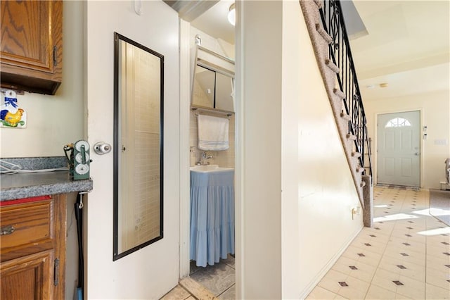 432 Neckar Ave, Staten Island, NY 10304 - hallway with stairs and light tile patterned flooring