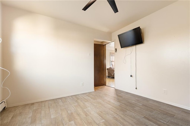 432 Neckar Ave, Staten Island, NY 10304 - unfurnished room with a ceiling fan, light wood-style floors, and baseboards