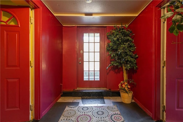 432 Neckar Ave, Staten Island, NY 10304 - foyer entrance featuring baseboards, healthy amount of natural light, and a textured ceiling