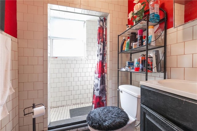 432 Neckar Ave, Staten Island, NY 10304 - bathroom with tile walls, a shower stall, toilet, and vanity