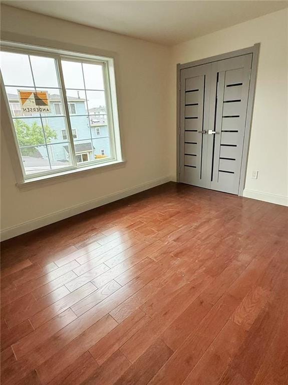 30 Church Ave, Staten Island, NY 10314 - spare room featuring plenty of natural light, wood finished floors, and baseboards