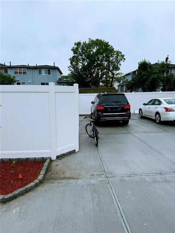 30 Church Ave, Staten Island, NY 10314 - view of vehicle parking with a gate