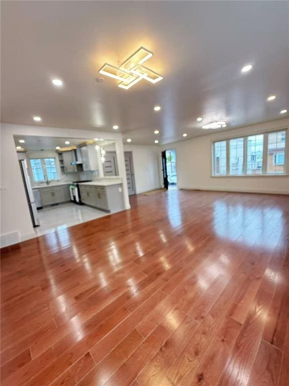 30 Church Ave, Staten Island, NY 10314 - unfurnished living room with plenty of natural light, light wood finished floors, and recessed lighting