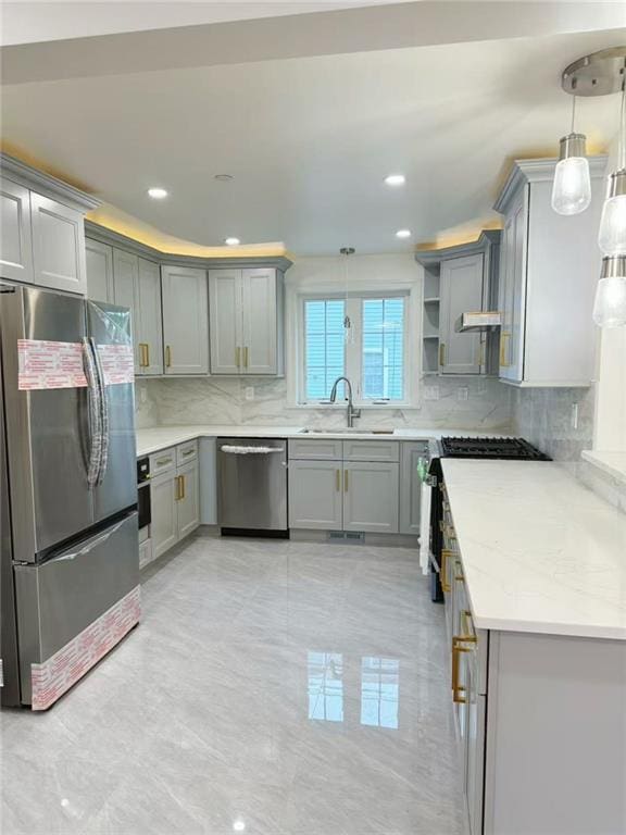 30 Church Ave, Staten Island, NY 10314 - kitchen with appliances with stainless steel finishes, a sink, gray cabinets, backsplash, and decorative light fixtures