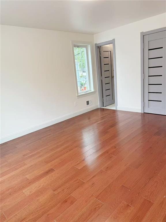30 Church Ave, Staten Island, NY 10314 - unfurnished room featuring light wood finished floors and baseboards