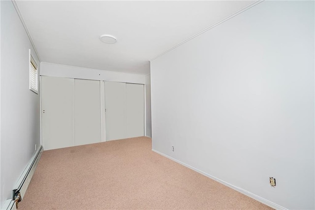 1929 E 36th St, Brooklyn, NY 11234 - unfurnished bedroom with a baseboard radiator, carpet, and a closet